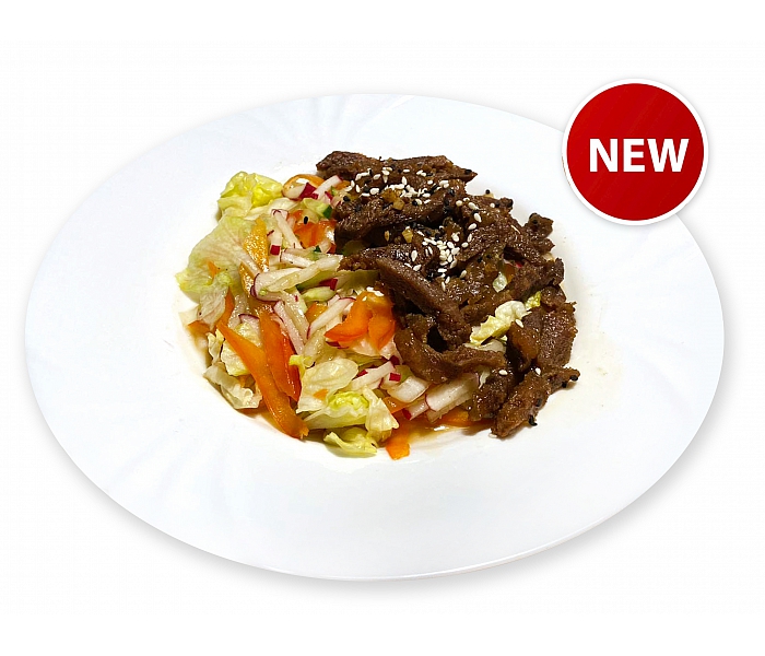 Теплый салат с говяжьими щечками